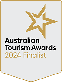 A badge with inscription: Australian Tourism Awards, 2024 Finalist