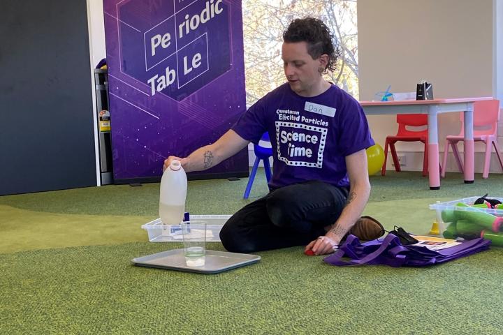 image of science time presenter getting ready for presentation