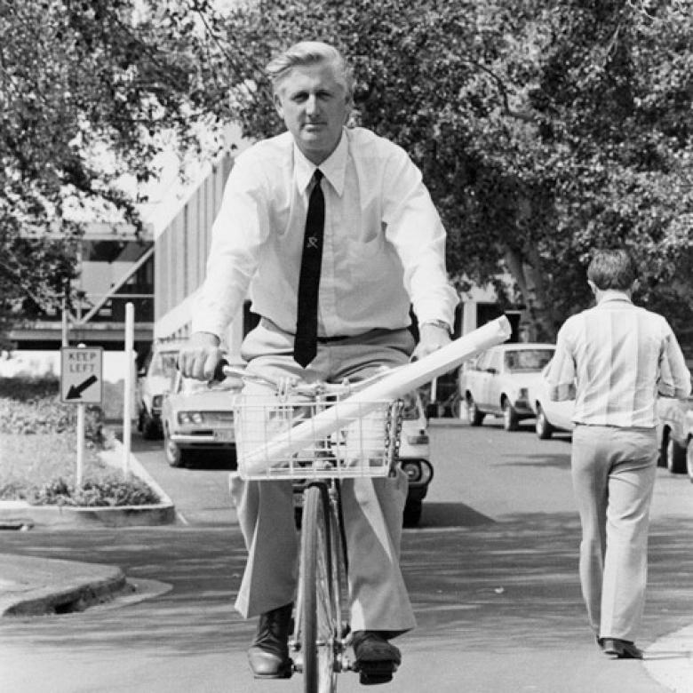 Founder Mike Gore on a bicycle